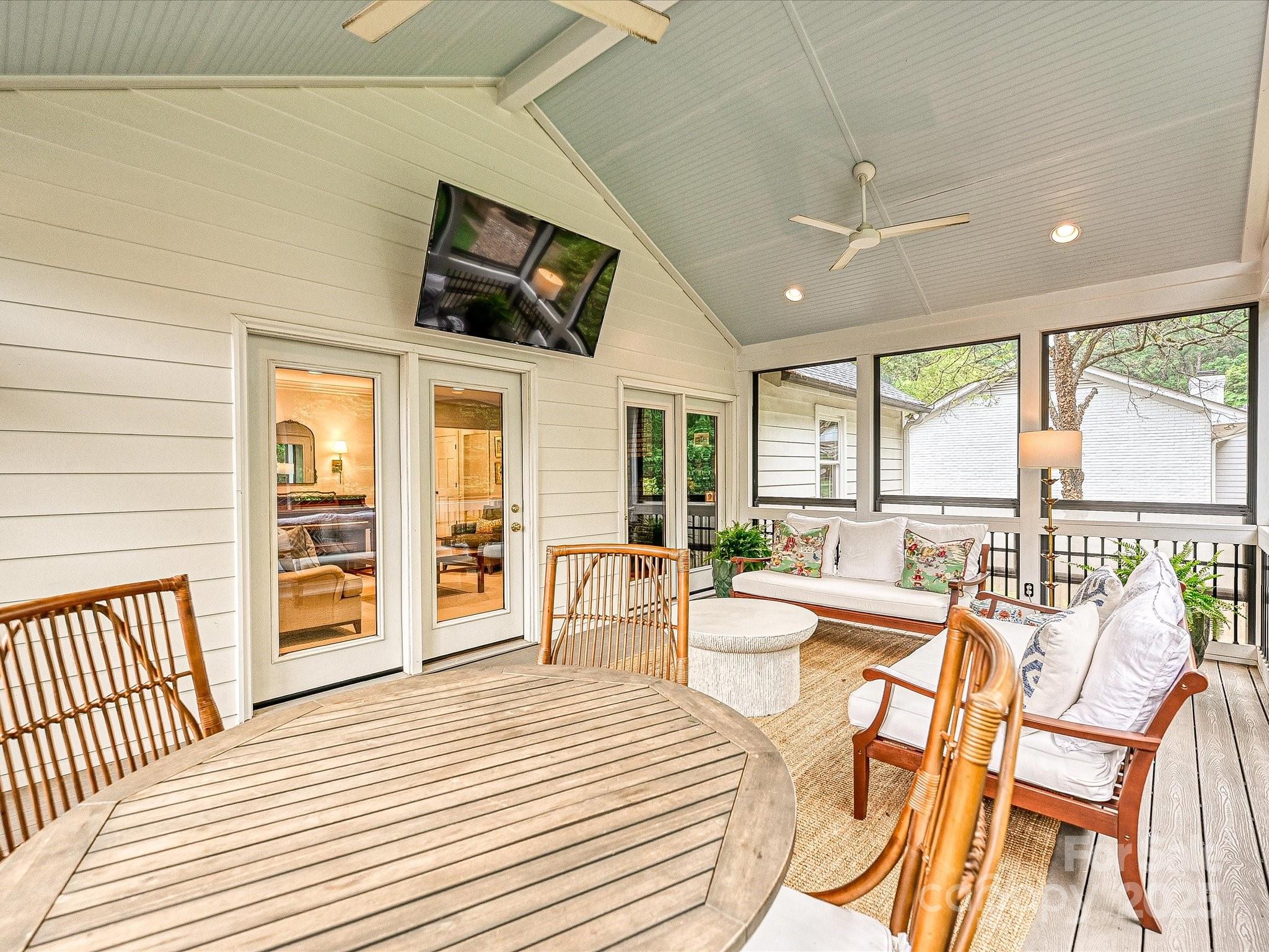 3610 Mill Pond Road Charlotte, NC 28226 - Photo 16 of 35 a living room with a large window wooden floor and furniture