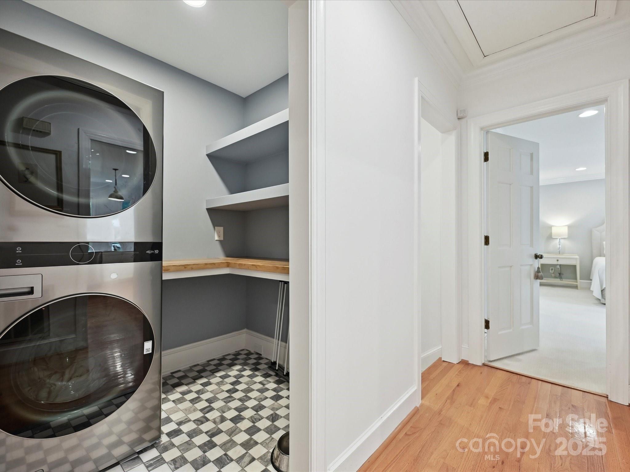 3610 Mill Pond Road Charlotte, NC 28226 - Photo 17 of 35 a view of a bedroom with washer and dryer
