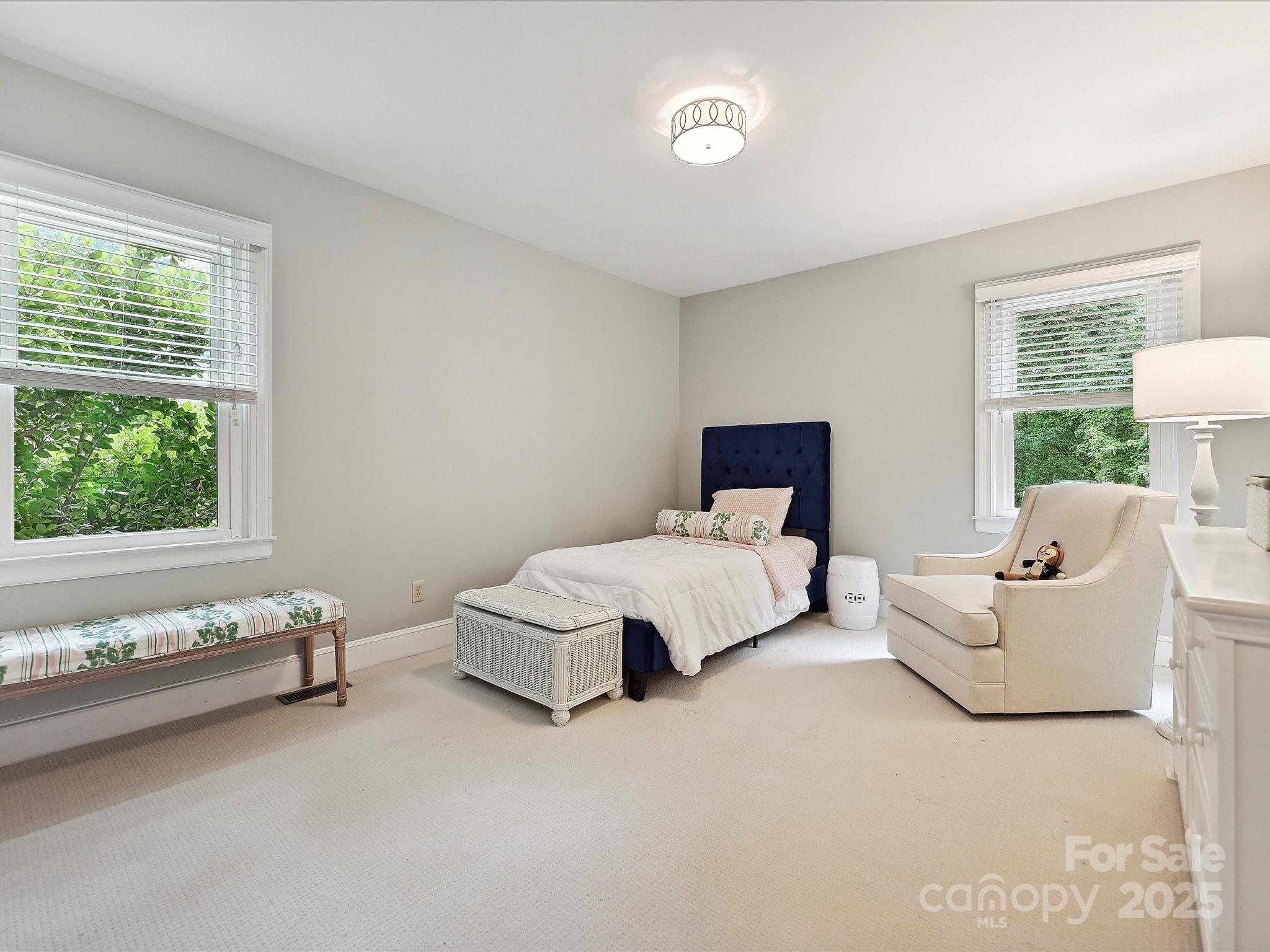 3610 Mill Pond Road Charlotte, NC 28226 - Photo 22 of 35 a bedroom with a bed and a window