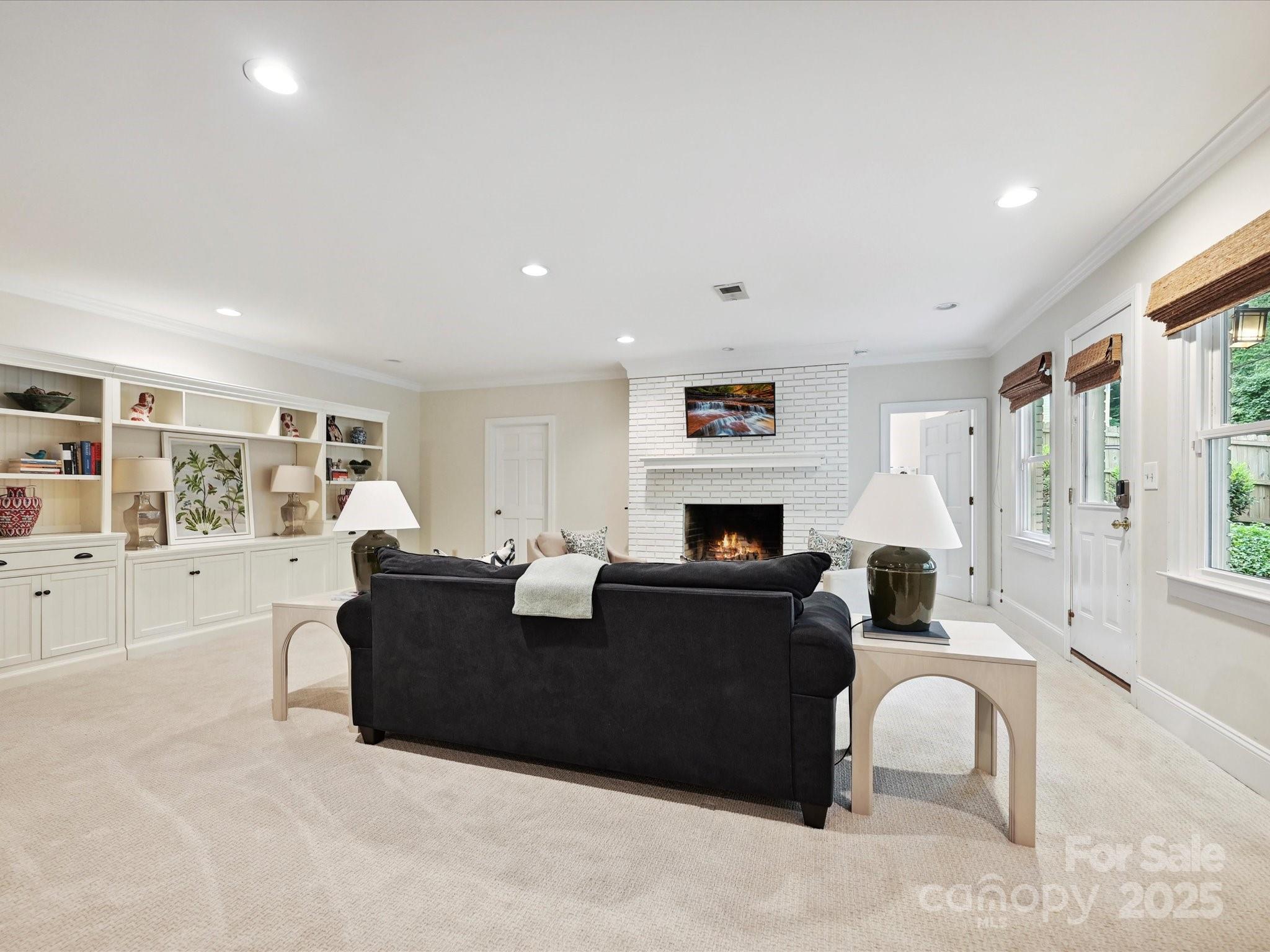 3610 Mill Pond Road Charlotte, NC 28226 - Photo 23 of 35 a living room with furniture and a flat screen tv