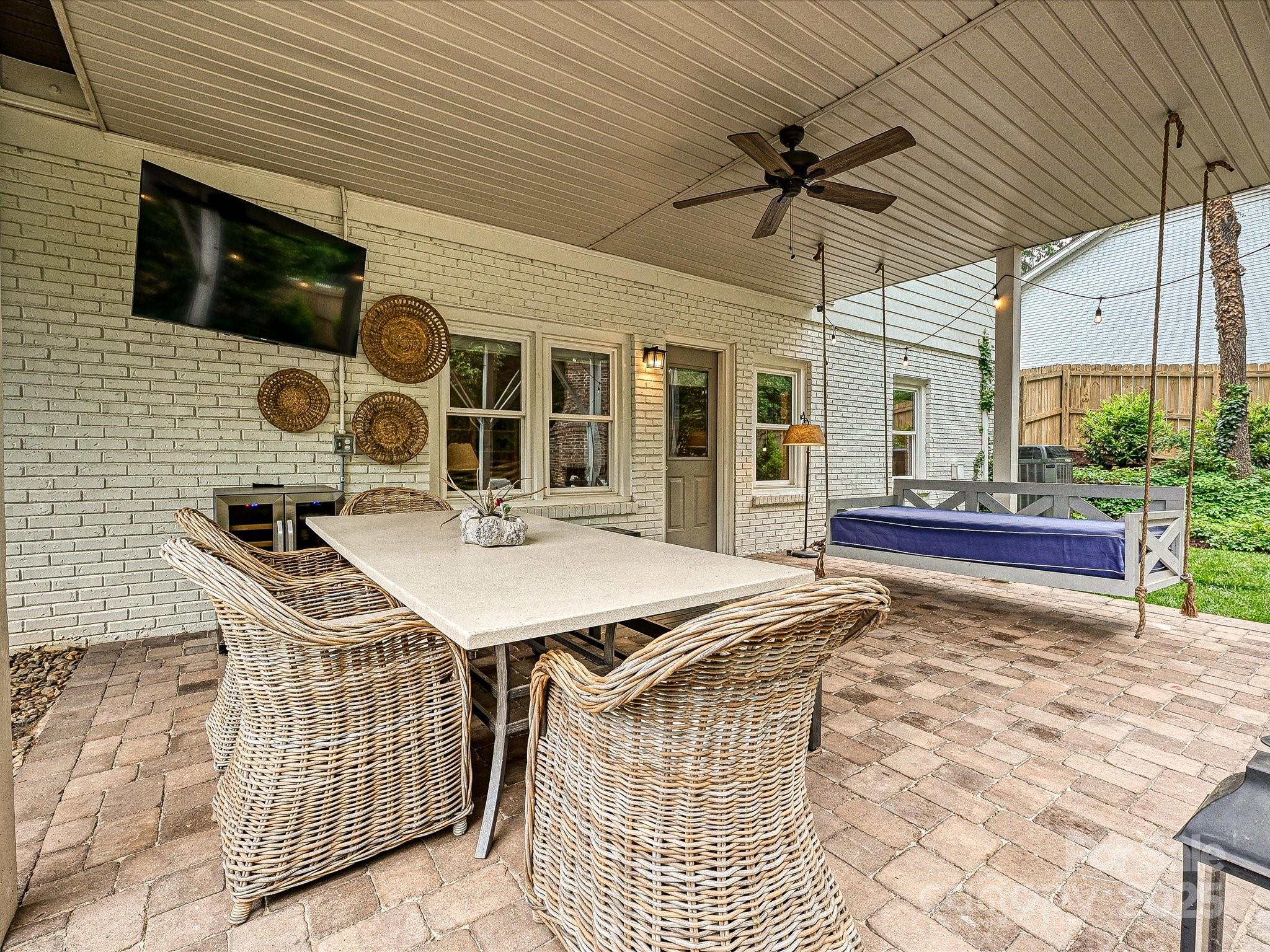 3610 Mill Pond Road Charlotte, NC 28226 - Photo 28 of 35 a roof deck with table and chairs