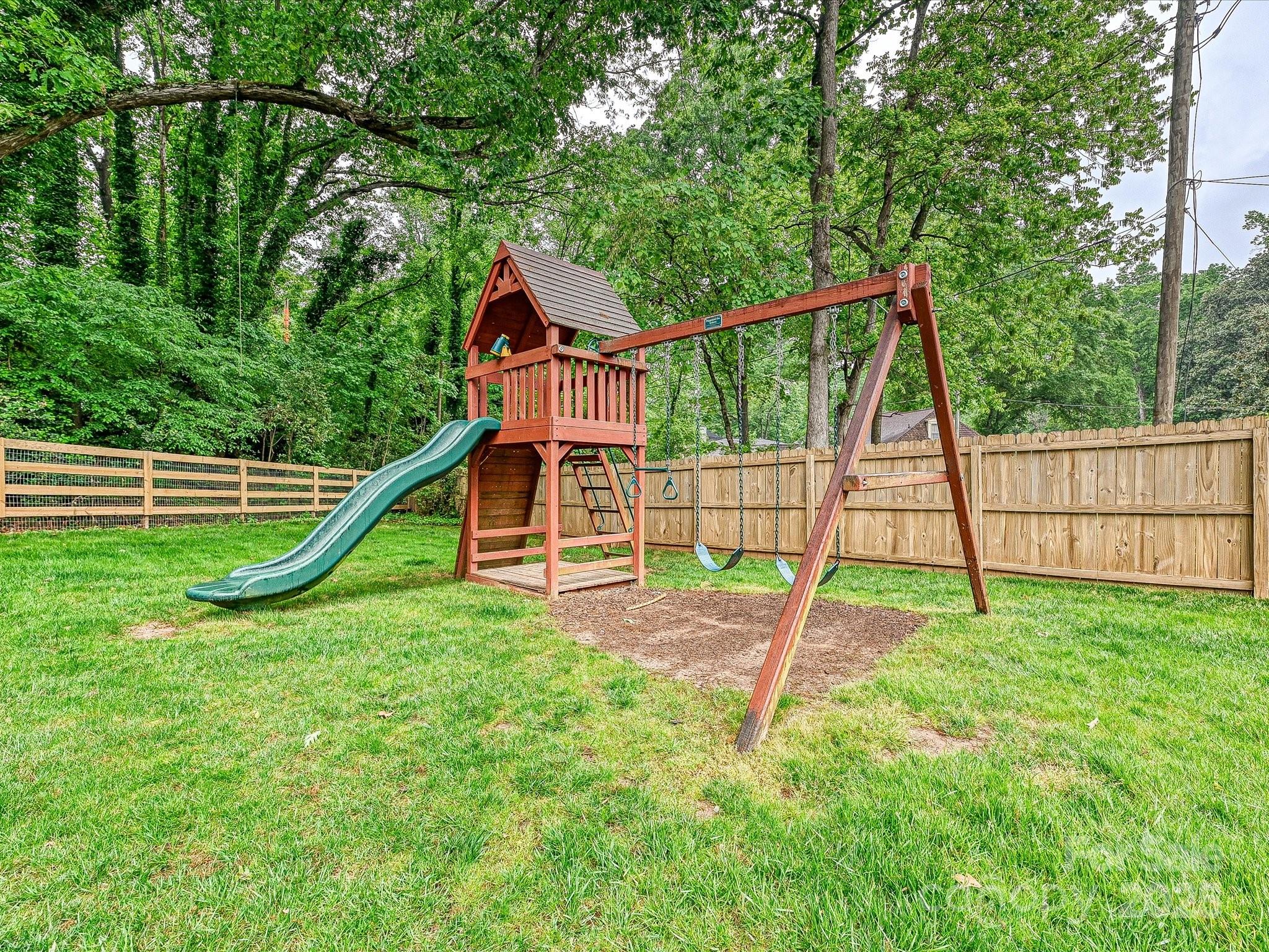 3610 Mill Pond Road Charlotte, NC 28226 - Photo 32 of 35 a view of a house with a park