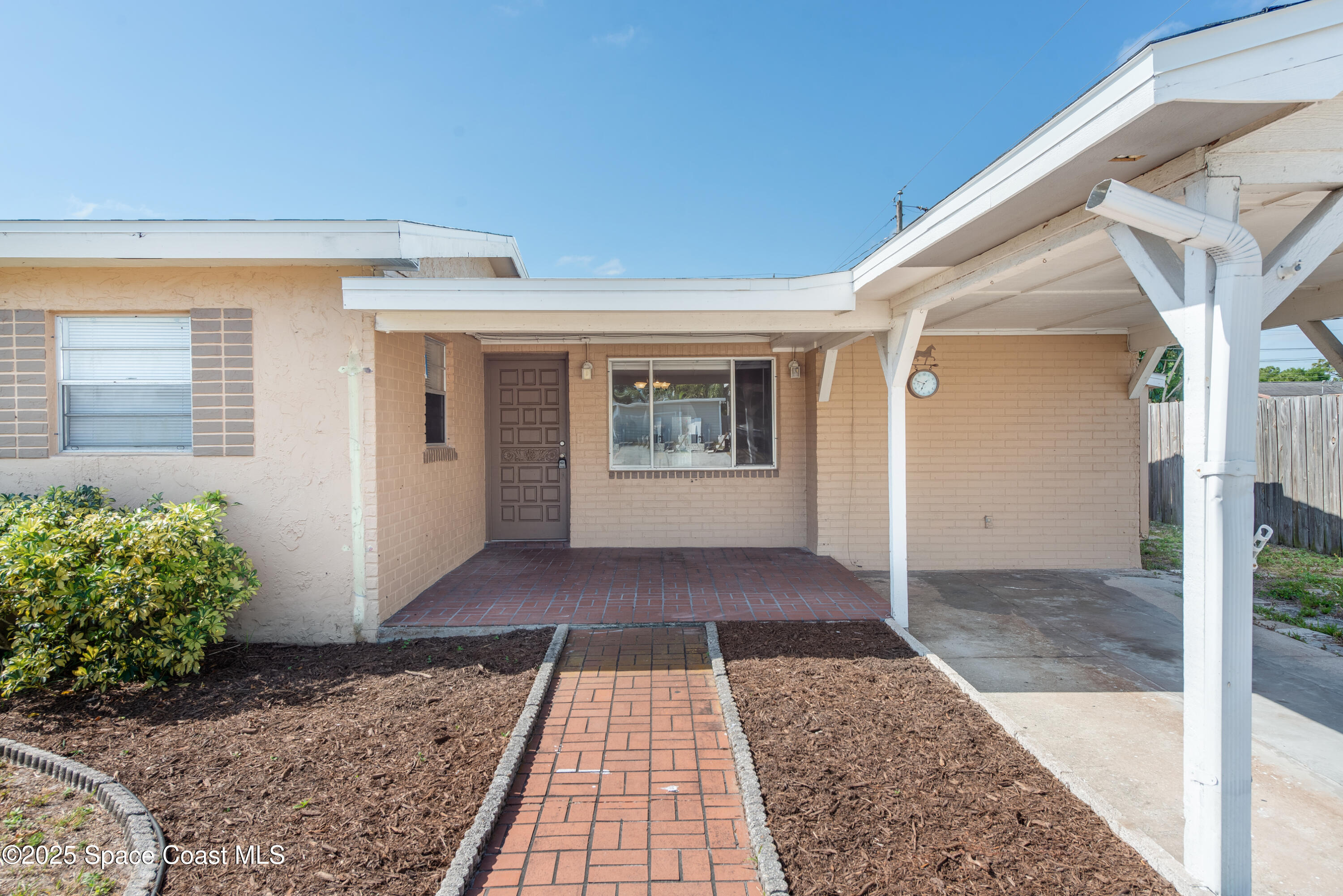 2021 Nottingham Road Melbourne, FL 32935 - Photo 2 of 28 Front Patio w/ Shade All Day!