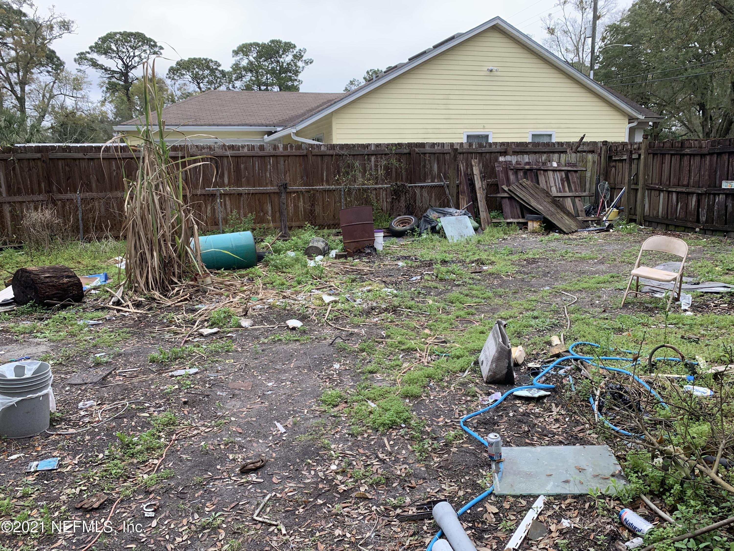 3852 Grant Road Jacksonville, FL 32207 - Photo 16 of 25 a view of a backyard with furniture