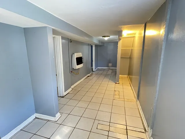 a kitchen with a stove and a sink