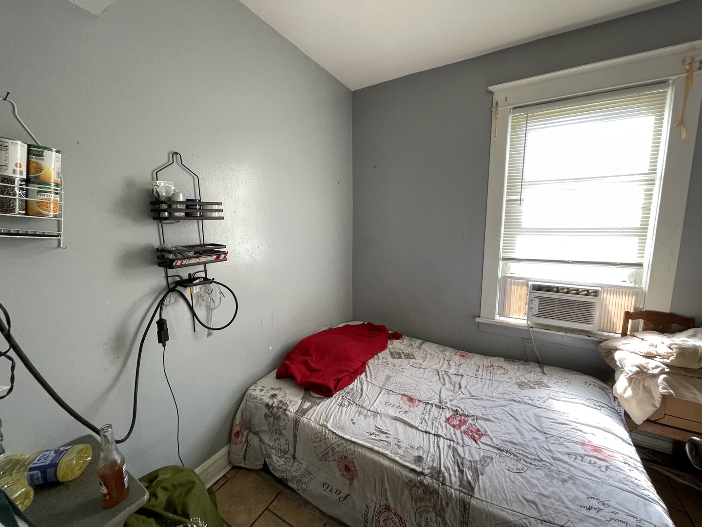 15736 Lathrop Avenue Harvey, IL 60426 - Photo 17 of 20 a bedroom with a bed and windows