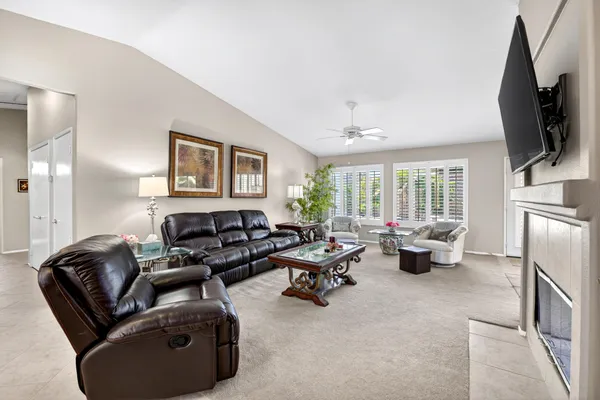 a view of swimming pool with outdoor seating