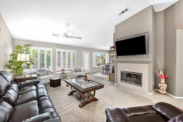 a table and chairs in front of a building
