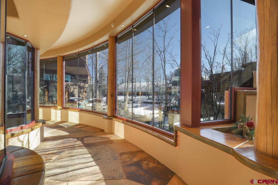 1900 County Road 124 Mancos, CO 81328 - Photo 12 of 35 a swimming pool with outdoor seating and yard