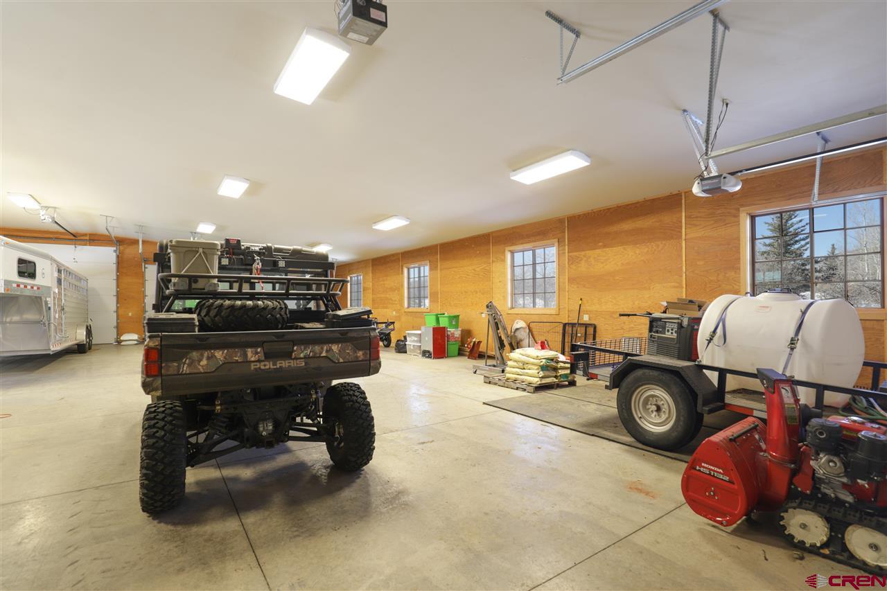 1900 County Road 124 Mancos, CO 81328 - Photo 31 of 35 a room with furniture and a flat screen tv