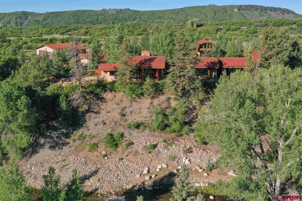 1900 County Road 124 Mancos, CO 81328 - Photo 34 of 35 a view of a house with a yard