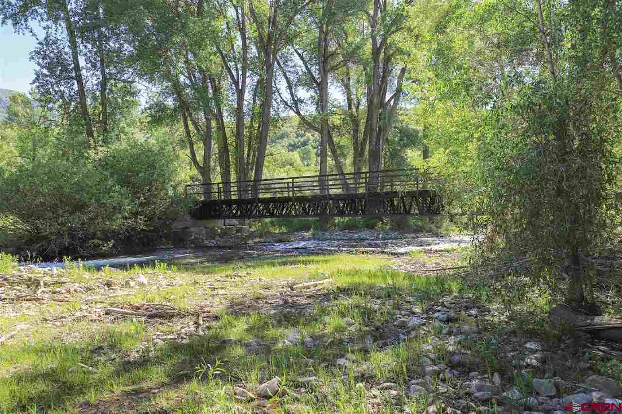 1900 County Road 124 Mancos, CO 81328 - Photo 35 of 35 a view of a swimming pool with a bench