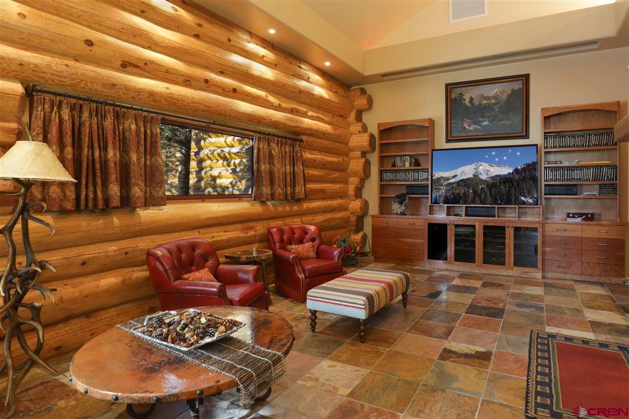 1900 County Road 124 Mancos, CO 81328 - Photo 6 of 35 a living room with furniture and a large window