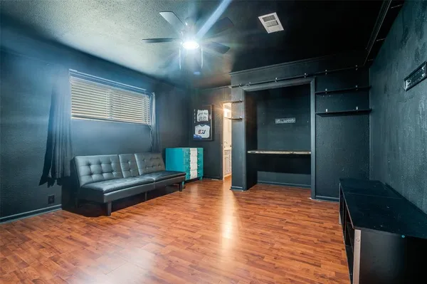 a view of livingroom with furniture and closet