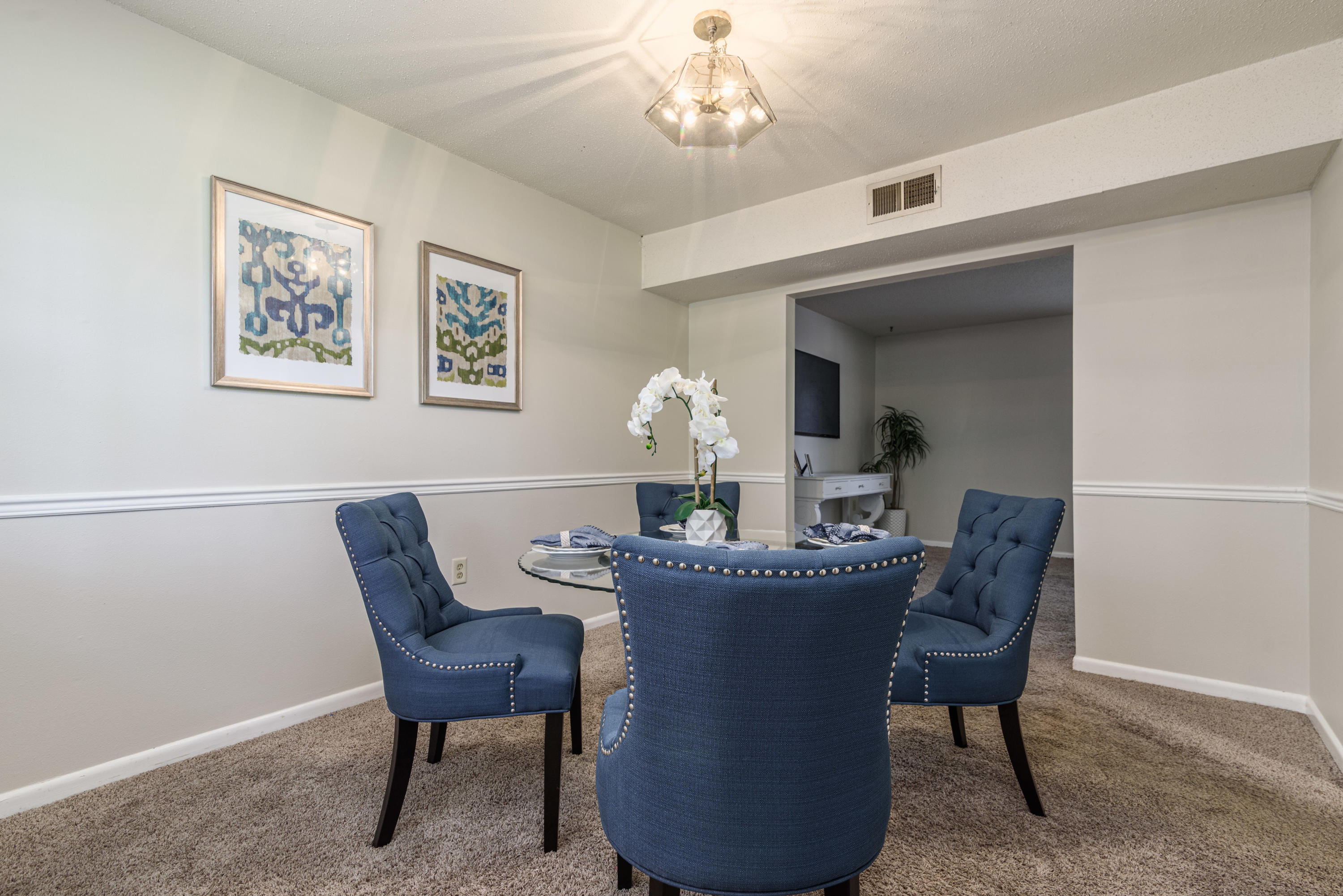 187 Country Club Road Shalimar, FL 32579 - Photo 11 of 68 a dining room with furniture and chandelier