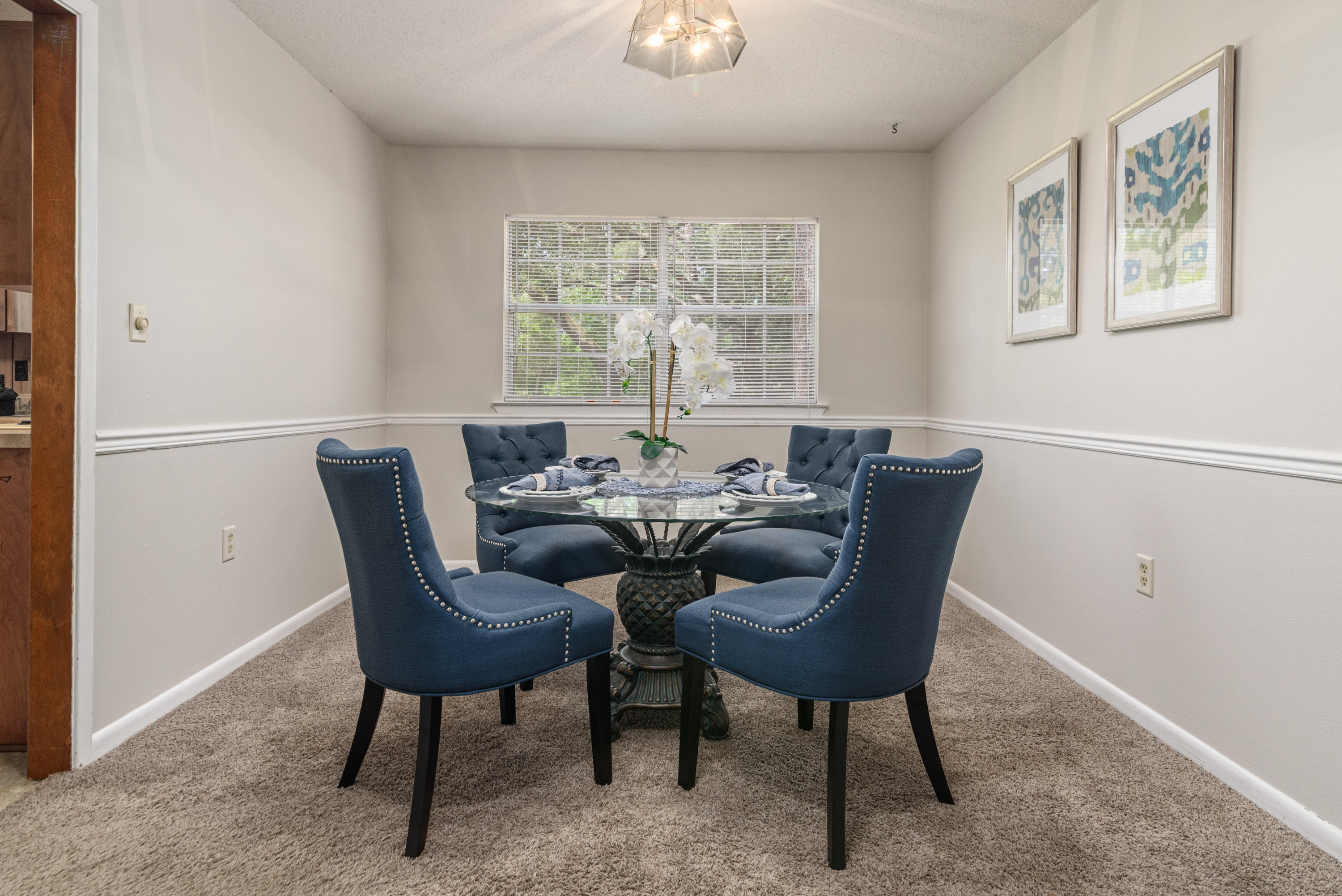 187 Country Club Road Shalimar, FL 32579 - Photo 12 of 68 a view of a dining room with furniture and a window