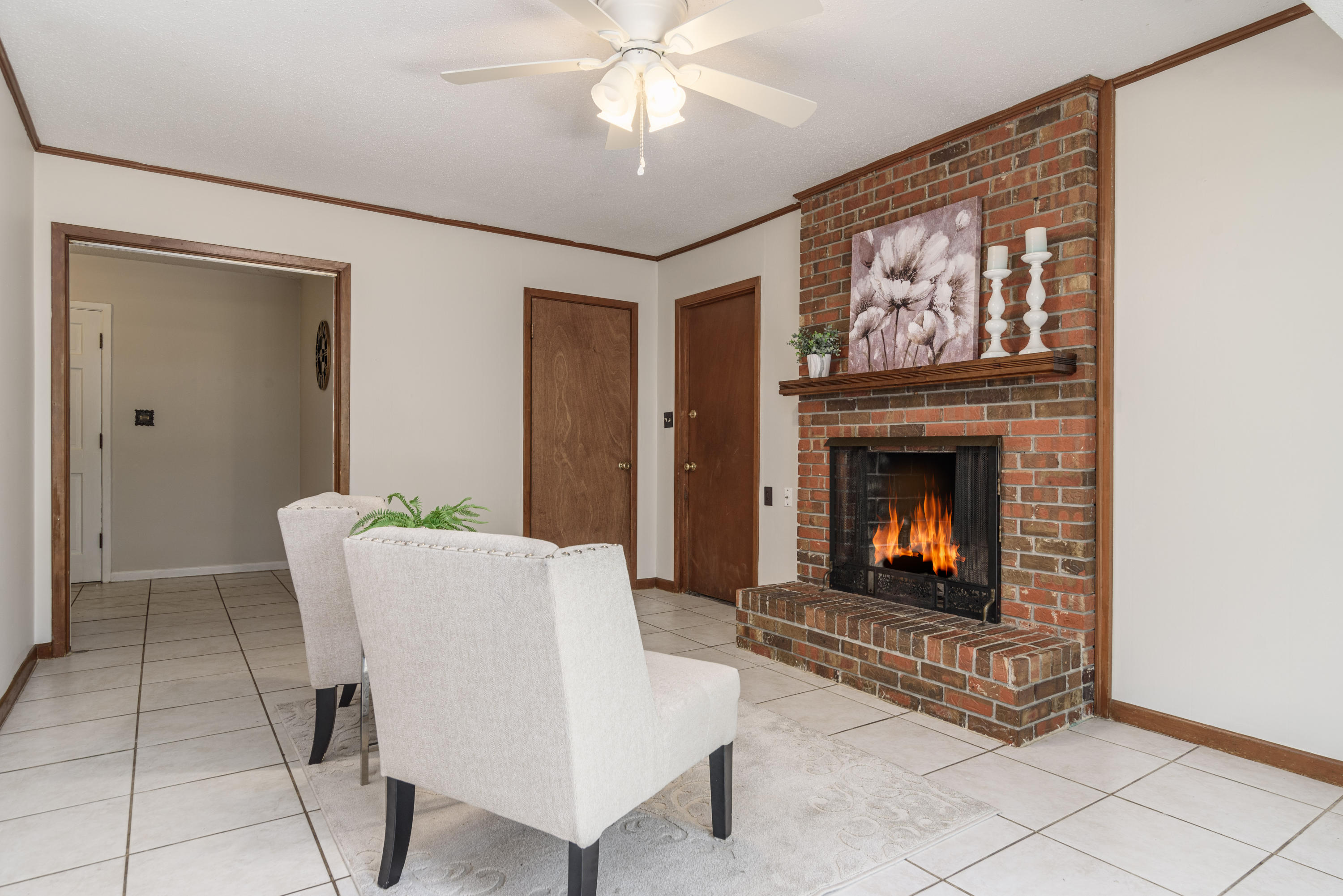 187 Country Club Road Shalimar, FL 32579 - Photo 22 of 68 a living room with furniture and a fireplace