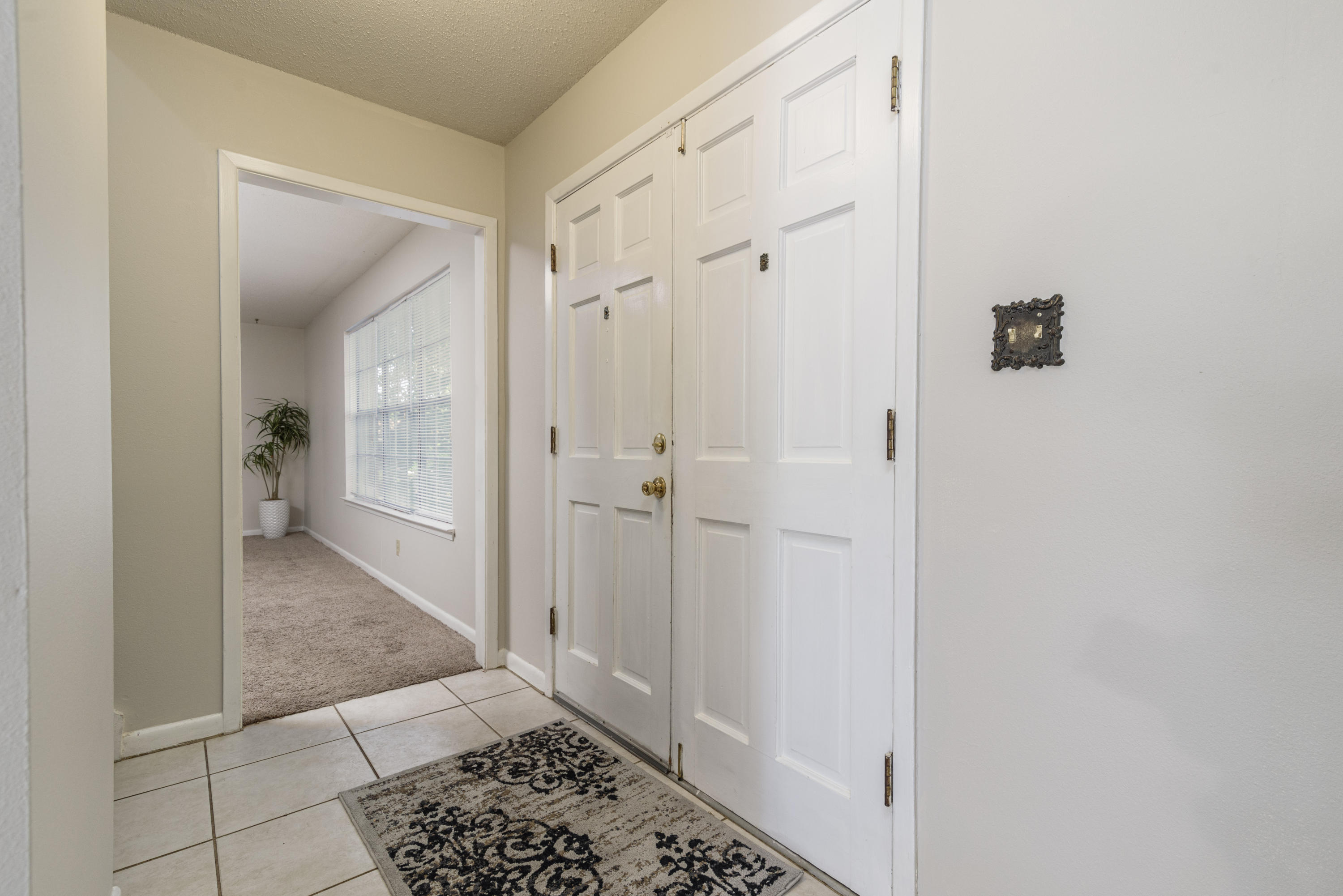 187 Country Club Road Shalimar, FL 32579 - Photo 5 of 68 a bathroom with a sink and a shower