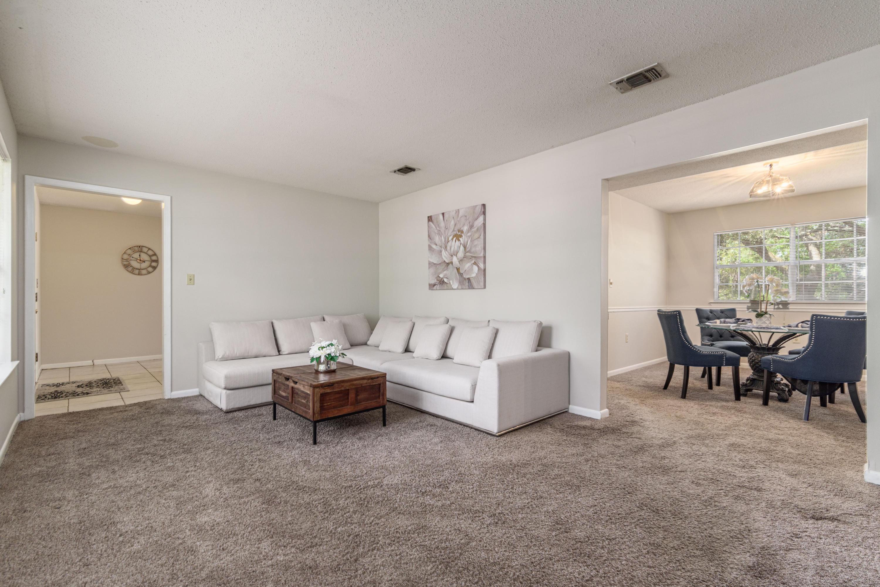 187 Country Club Road Shalimar, FL 32579 - Photo 6 of 68 a living room with furniture and a large window