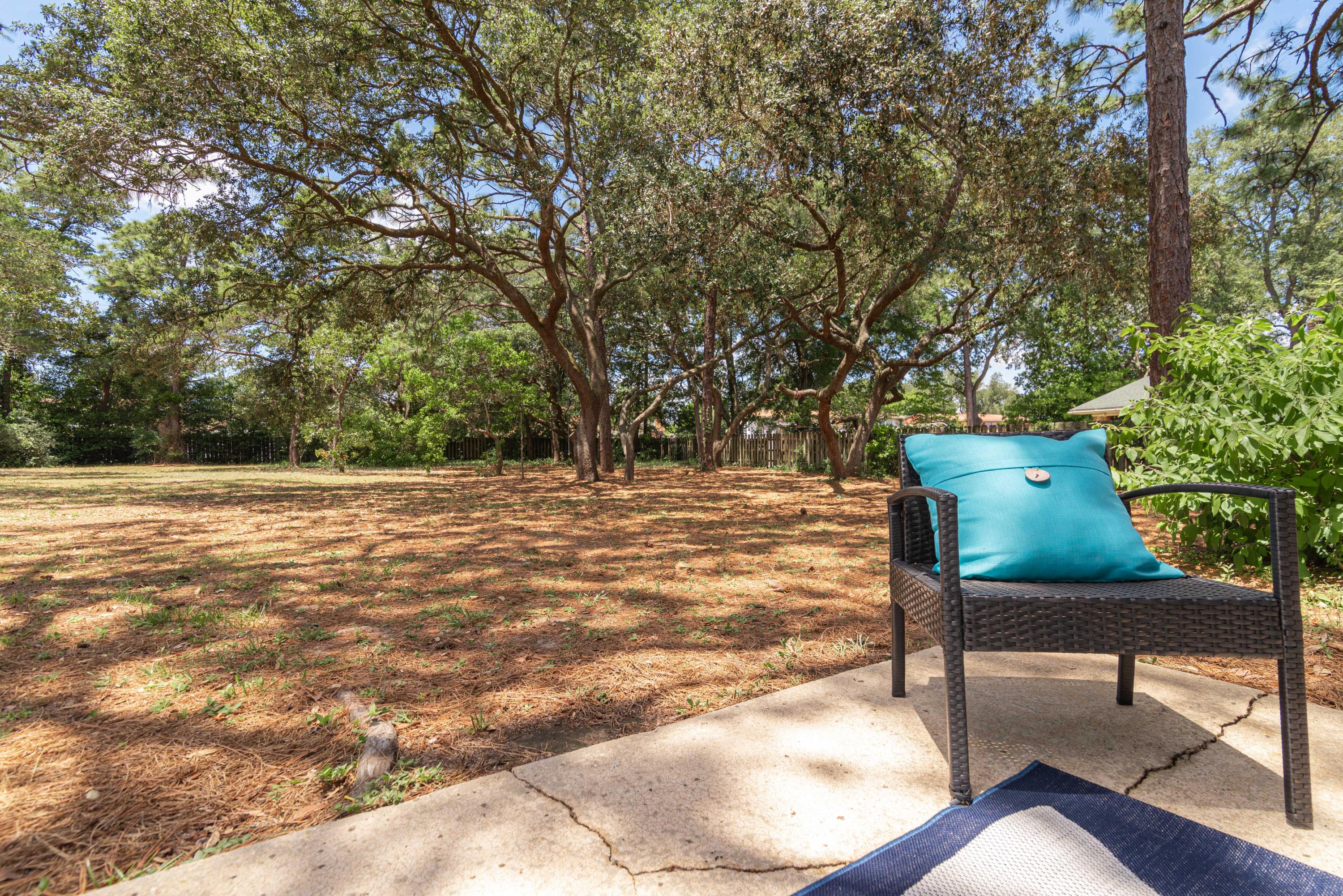 187 Country Club Road Shalimar, FL 32579 - Photo 58 of 68 a view of a chairs in a patio