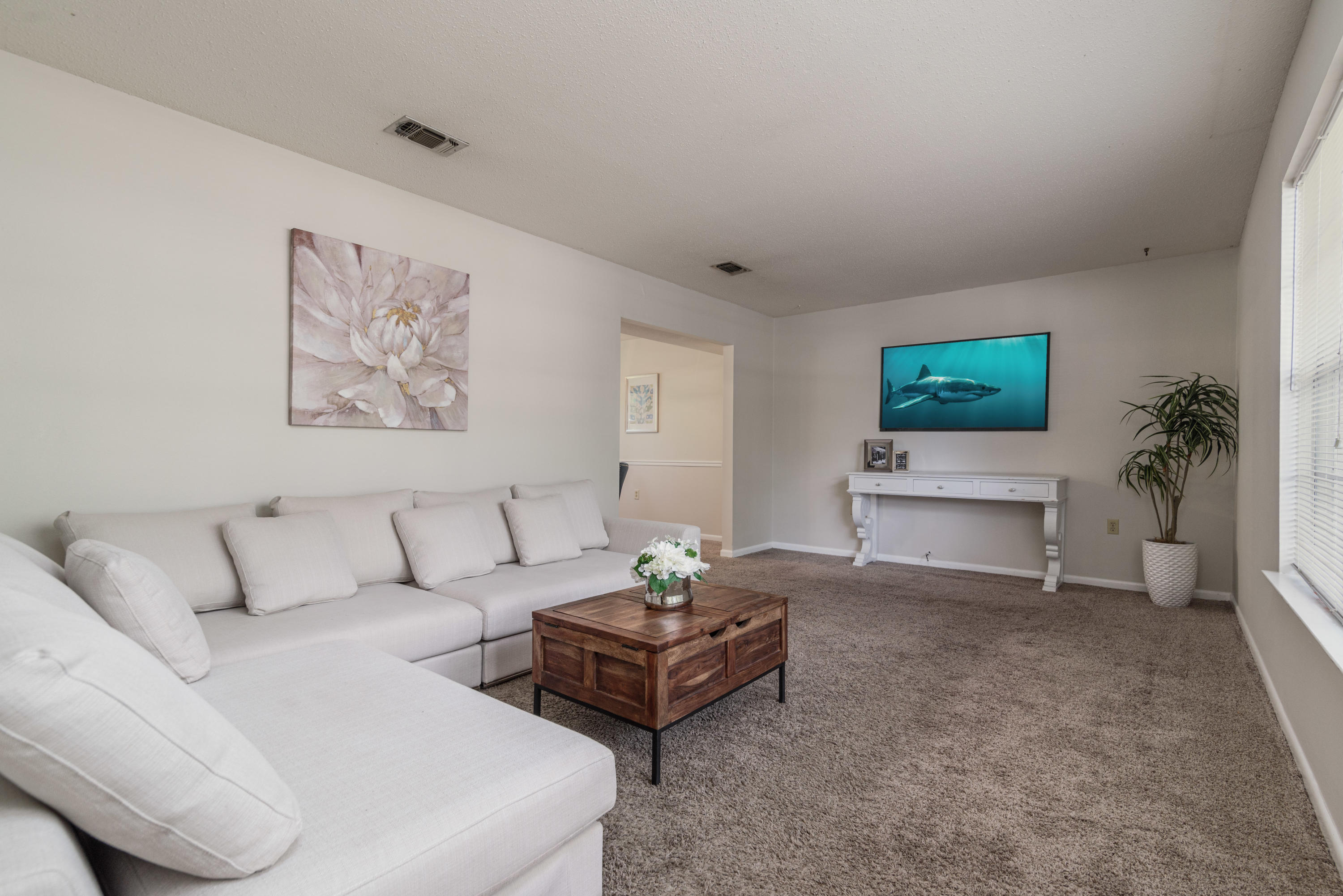 187 Country Club Road Shalimar, FL 32579 - Photo 7 of 68 a living room with furniture and a couch
