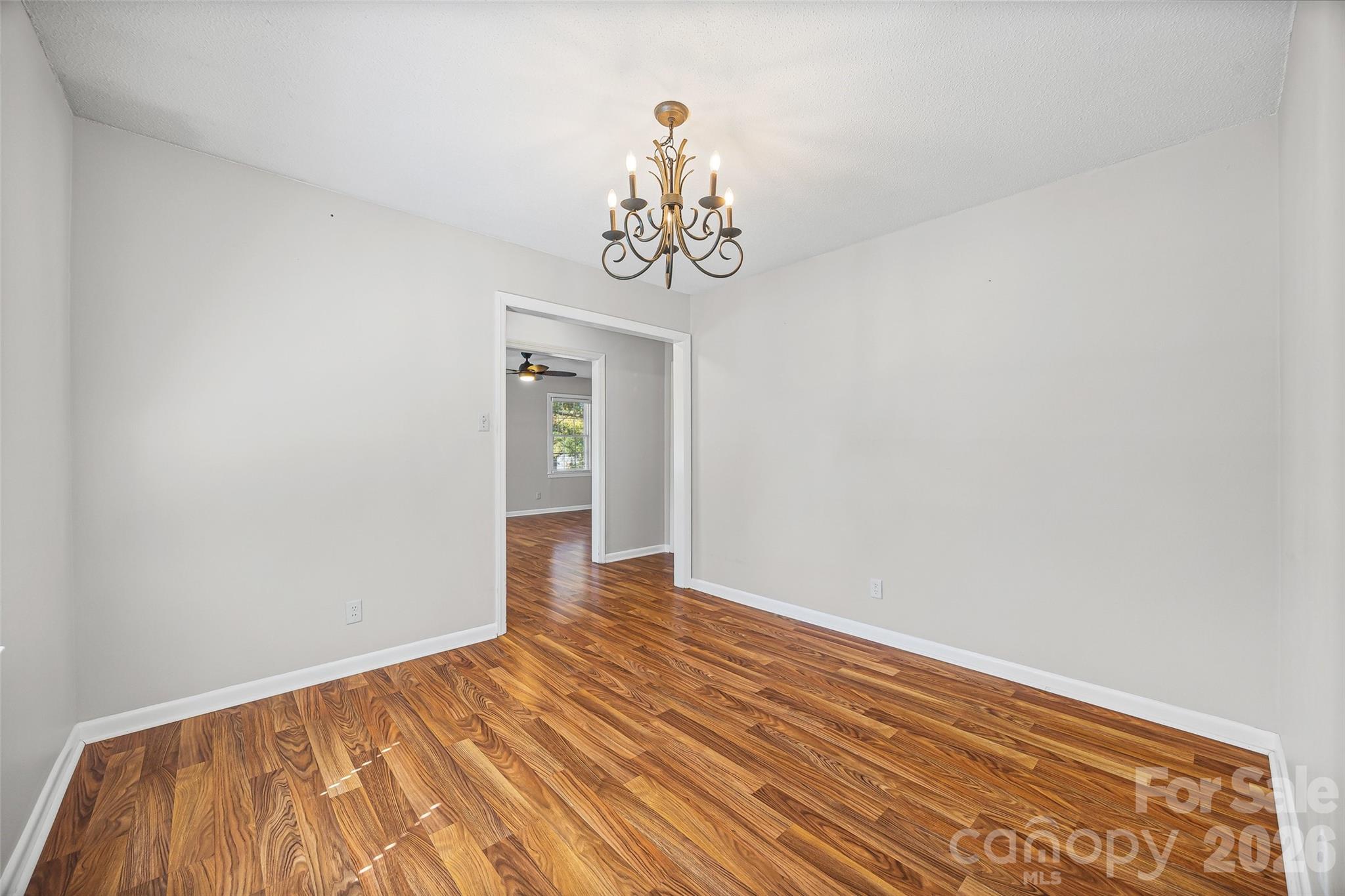 1412 Ebinport Road Rock Hill, SC 29732 - Photo 11 of 35 a view of a room with wooden floor and ceiling fan