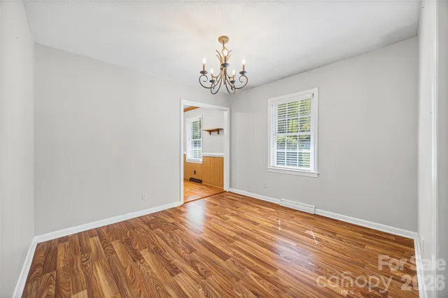 a kitchen with stainless steel appliances a stove microwave and cabinets