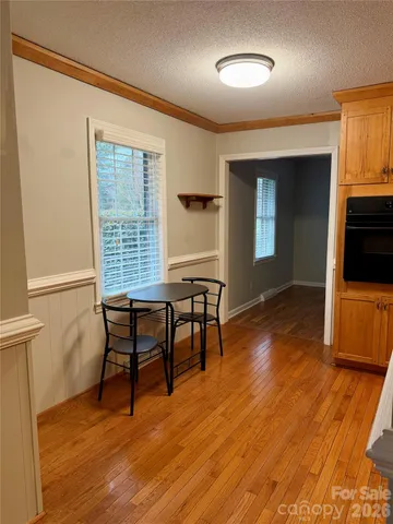 a kitchen with stainless steel appliances granite countertop a stove and a refrigerator