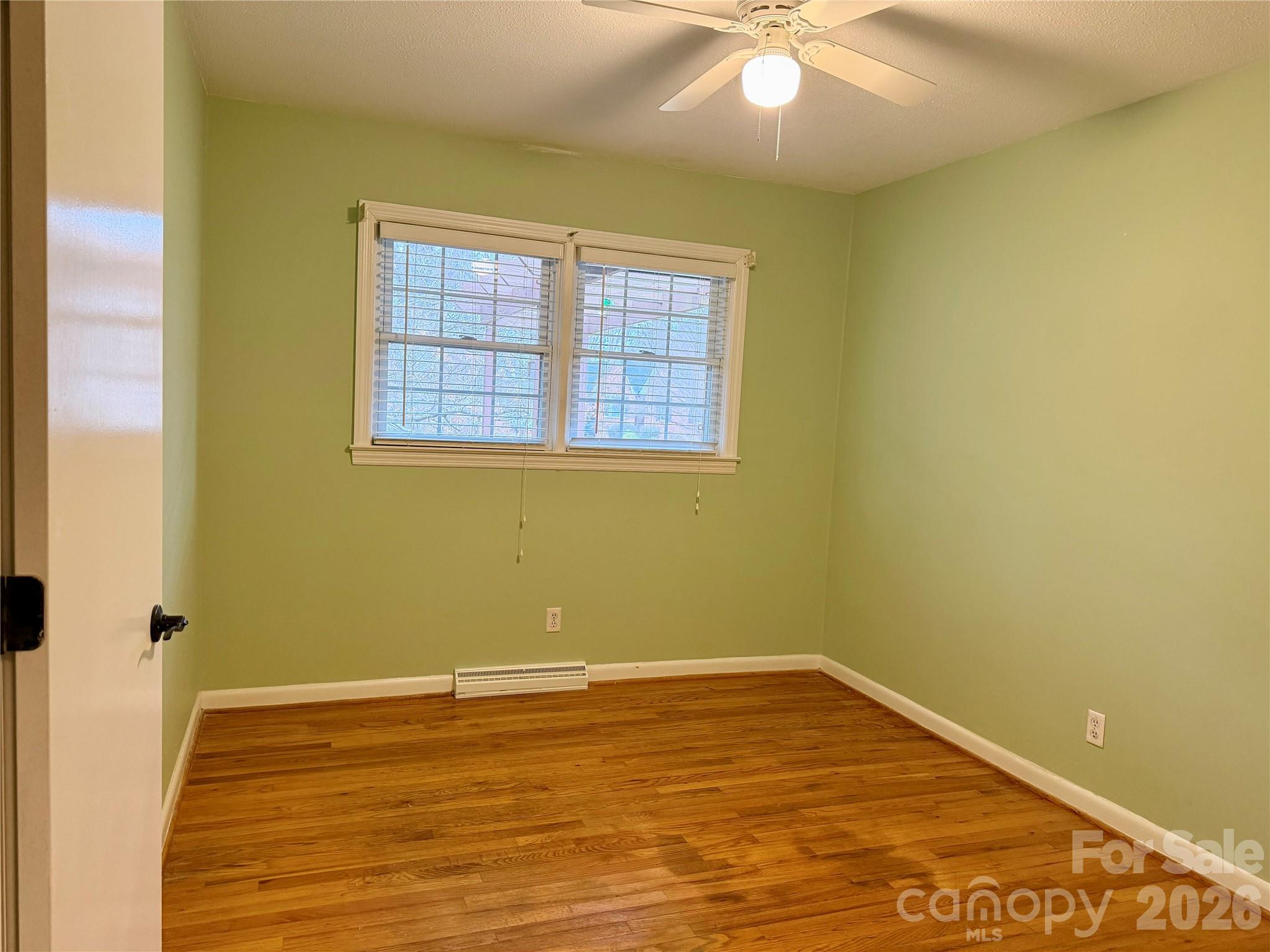 1412 Ebinport Road Rock Hill, SC 29732 - Photo 21 of 35 a view of a room with a window and wooden floor