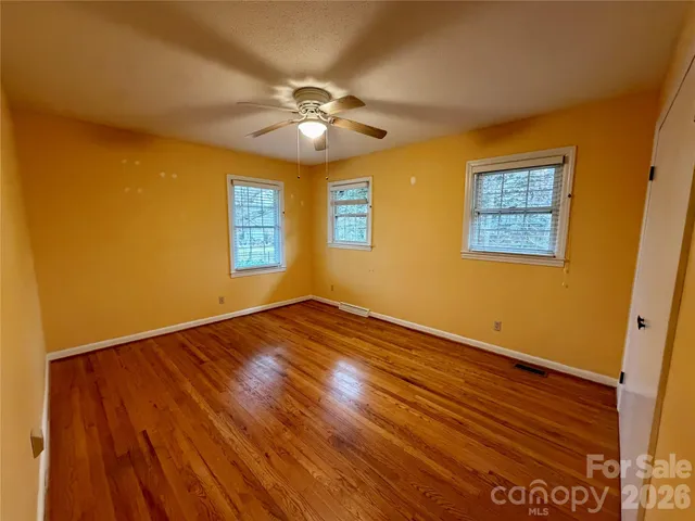 a bathroom with a double vanity sink and mirror