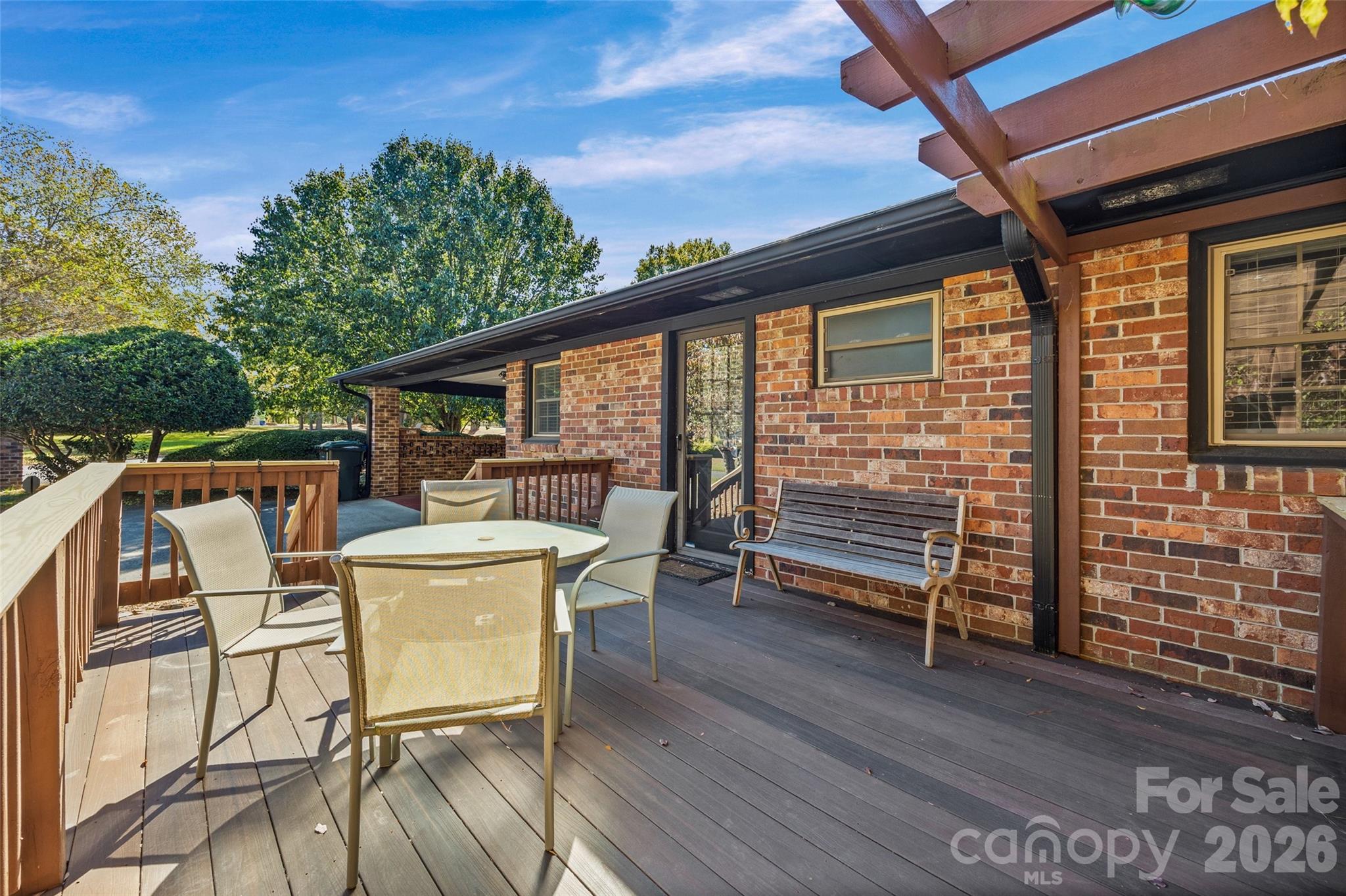 1412 Ebinport Road Rock Hill, SC 29732 - Photo 26 of 35 a view of a patio with table and chairs and wooden floor