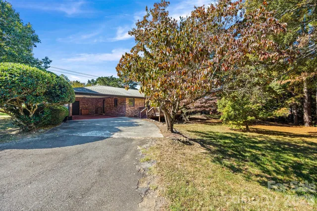 a view of road with trees