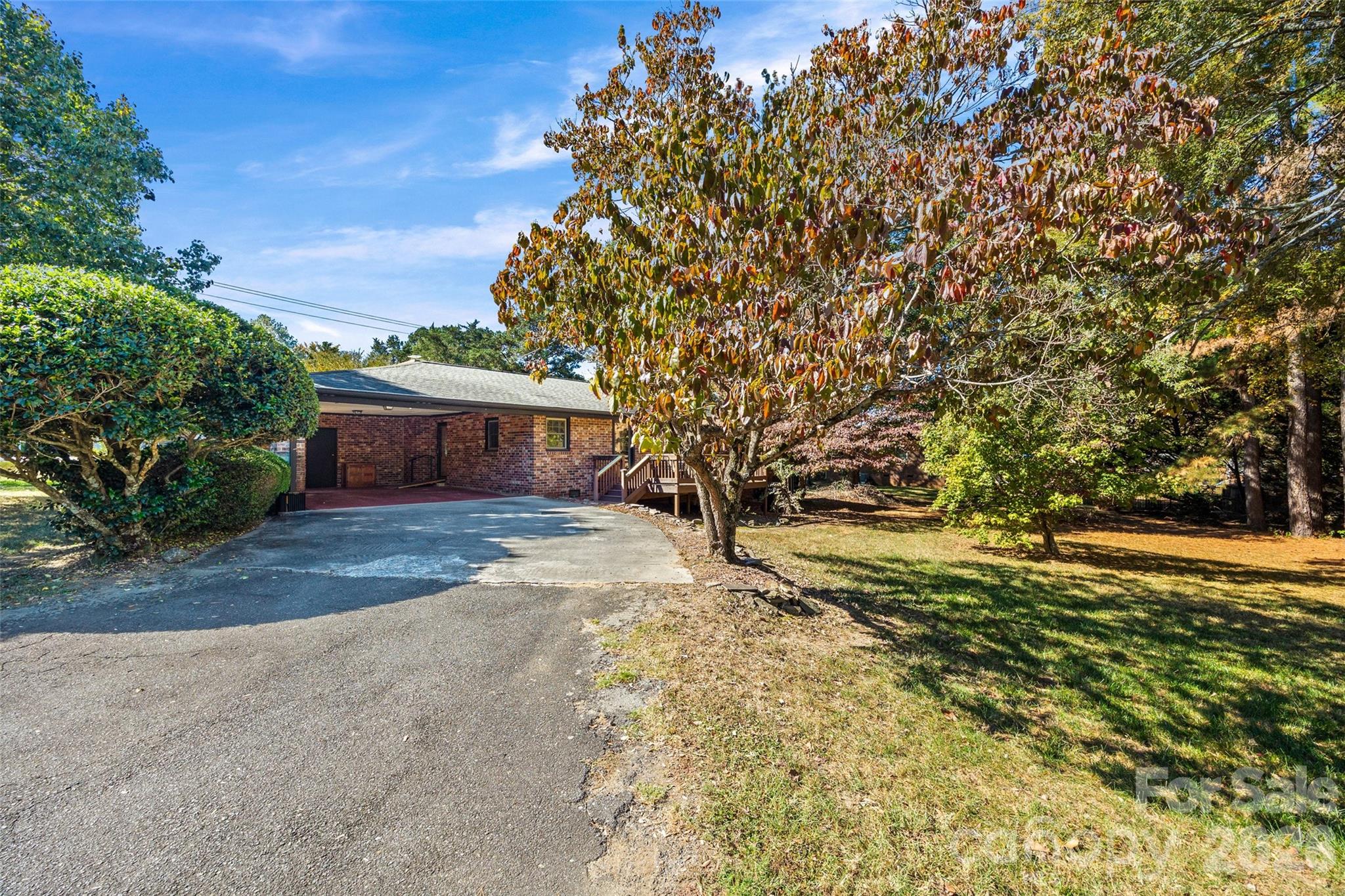 1412 Ebinport Road Rock Hill, SC 29732 - Photo 27 of 35 a front view of a house with a yard and trees