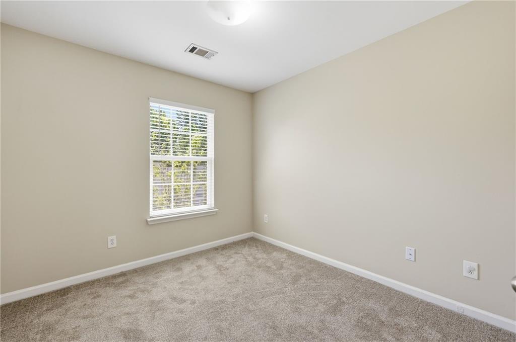 2335 Meadow Peak Point Duluth, GA 30097 - Photo 23 of 32 an empty room with a window