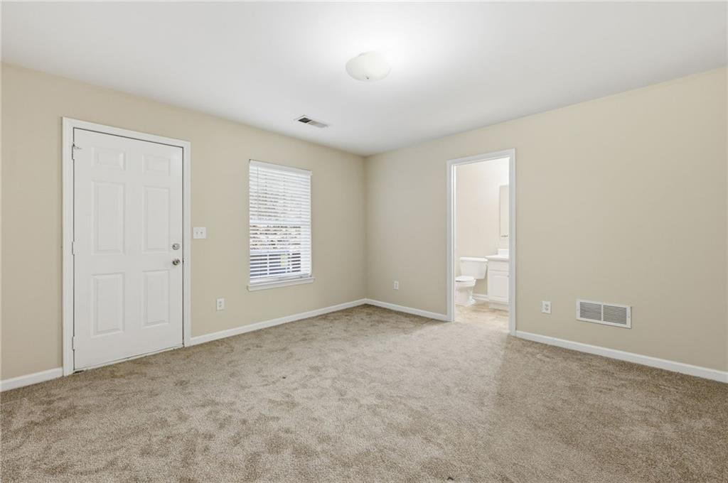 2335 Meadow Peak Point Duluth, GA 30097 - Photo 3 of 32 a view of an empty room with a window