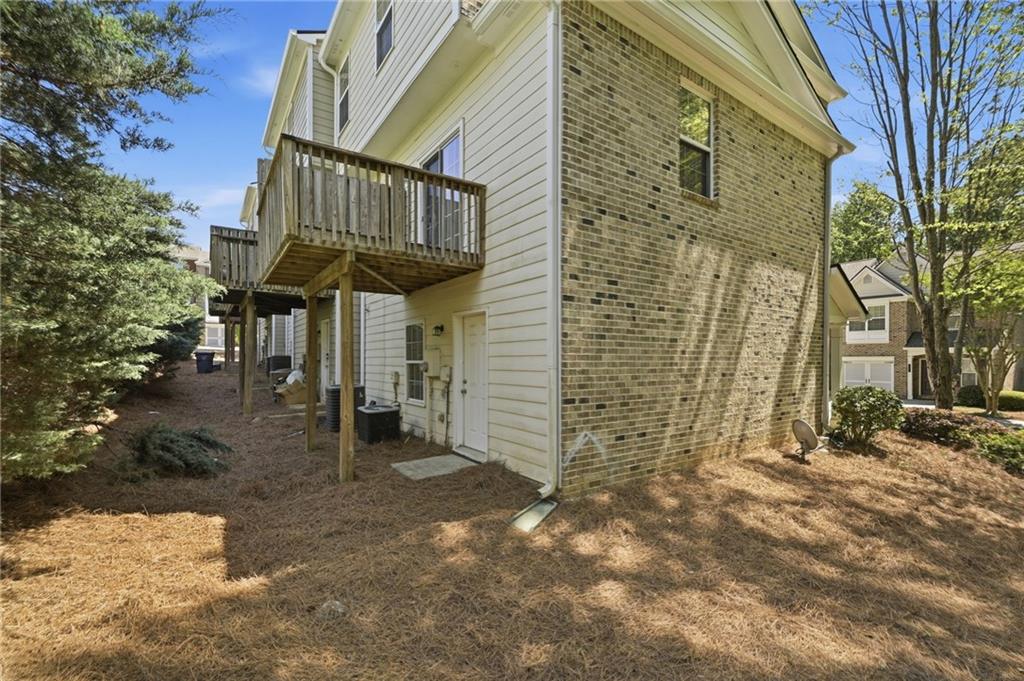 2335 Meadow Peak Point Duluth, GA 30097 - Photo 31 of 32 a view of a house with a yard