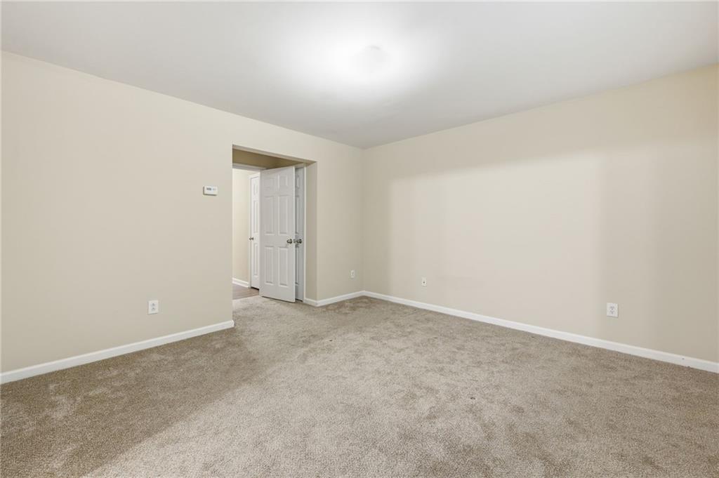 2335 Meadow Peak Point Duluth, GA 30097 - Photo 4 of 32 an empty room with a natural light