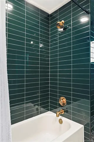 a bathroom with a sink toilet and mirror