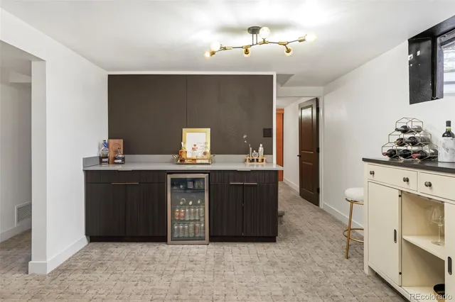 a bathroom with a sink vanity and mirror