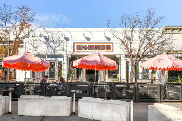 a view of a cafe with a patio