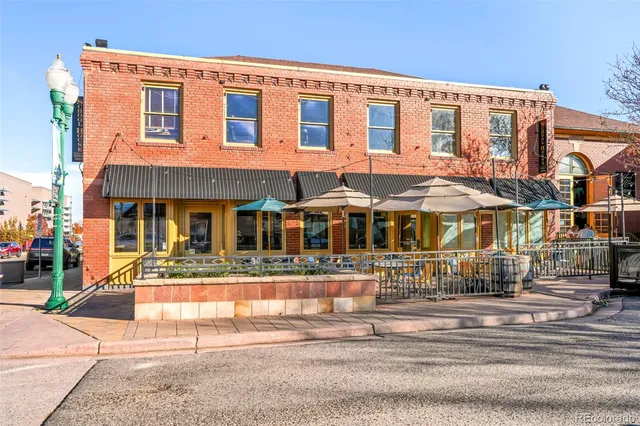 a front view of a building with street view
