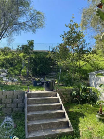 a view of outdoor space and yard