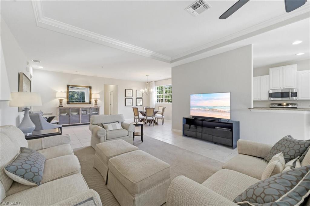 4695 Winged Foot Court, Unit 201 Naples, FL 34112 - Photo 1 of 27