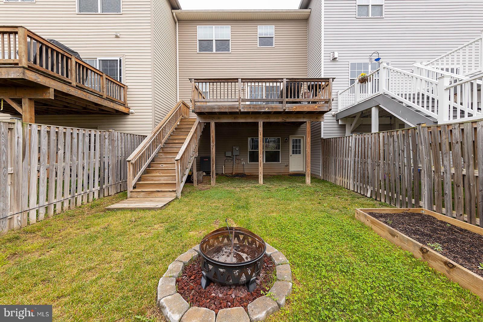 114 Brasstown Loop Stephenson, VA 22656 - Photo 41 of 53 Rear Yard and Deck