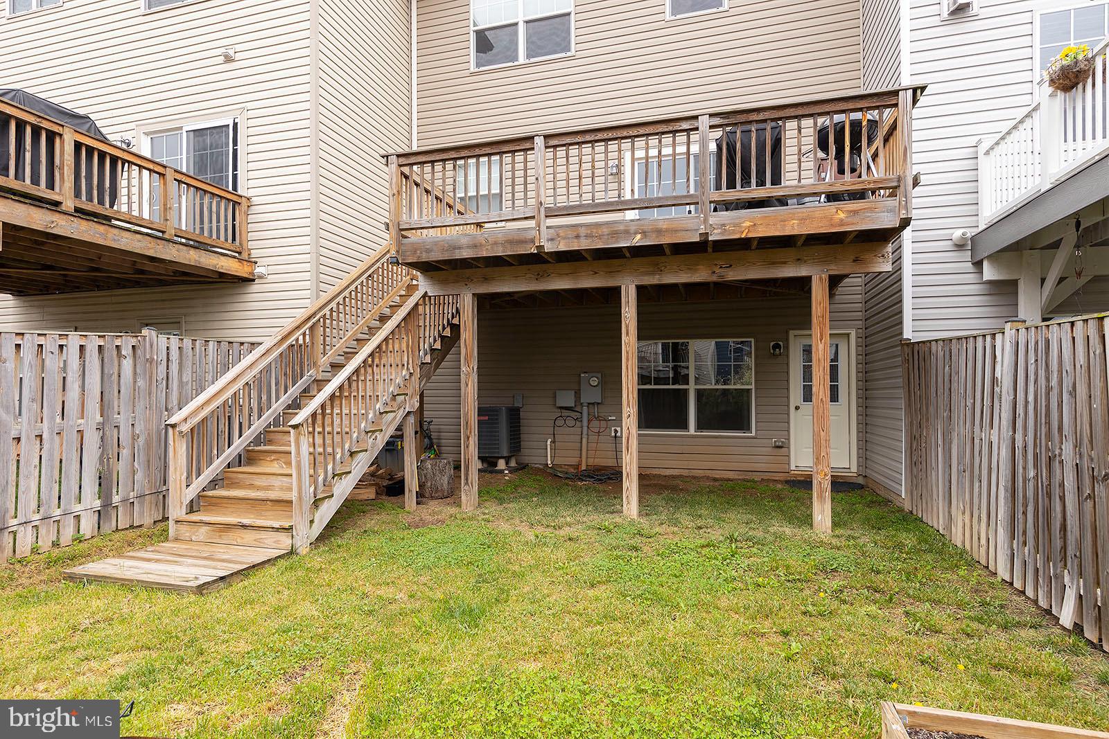 114 Brasstown Loop Stephenson, VA 22656 - Photo 42 of 53 Rear Yard and Deck