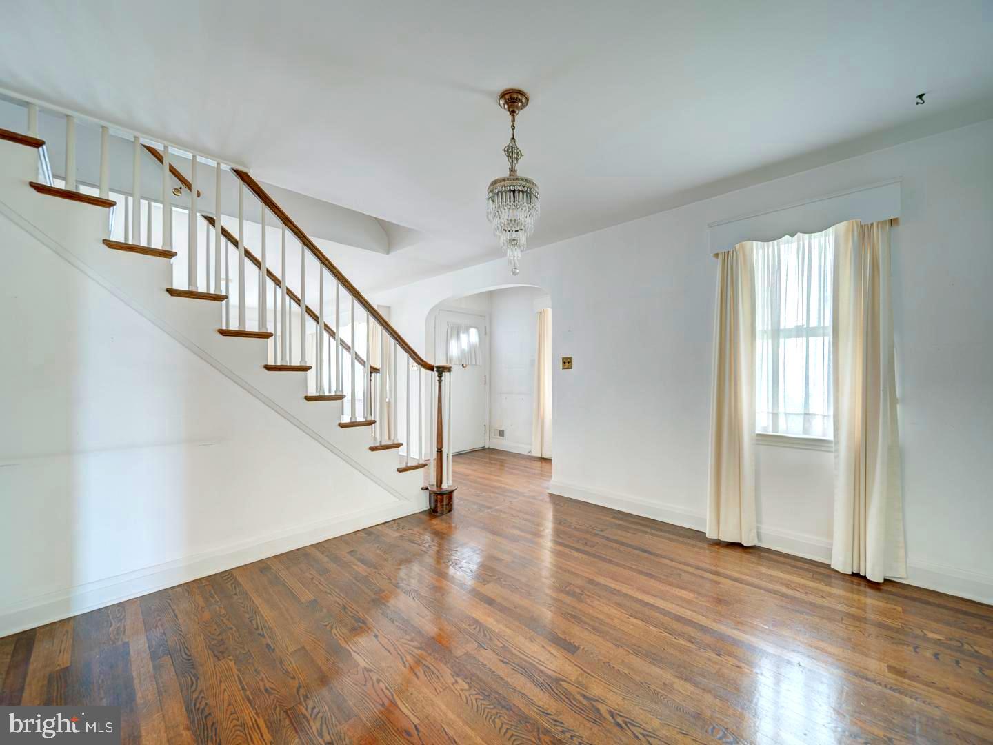 6505 Beechwood Road Baltimore, MD 21239 - Photo 11 of 46 a view of entryway and hall with wooden floor