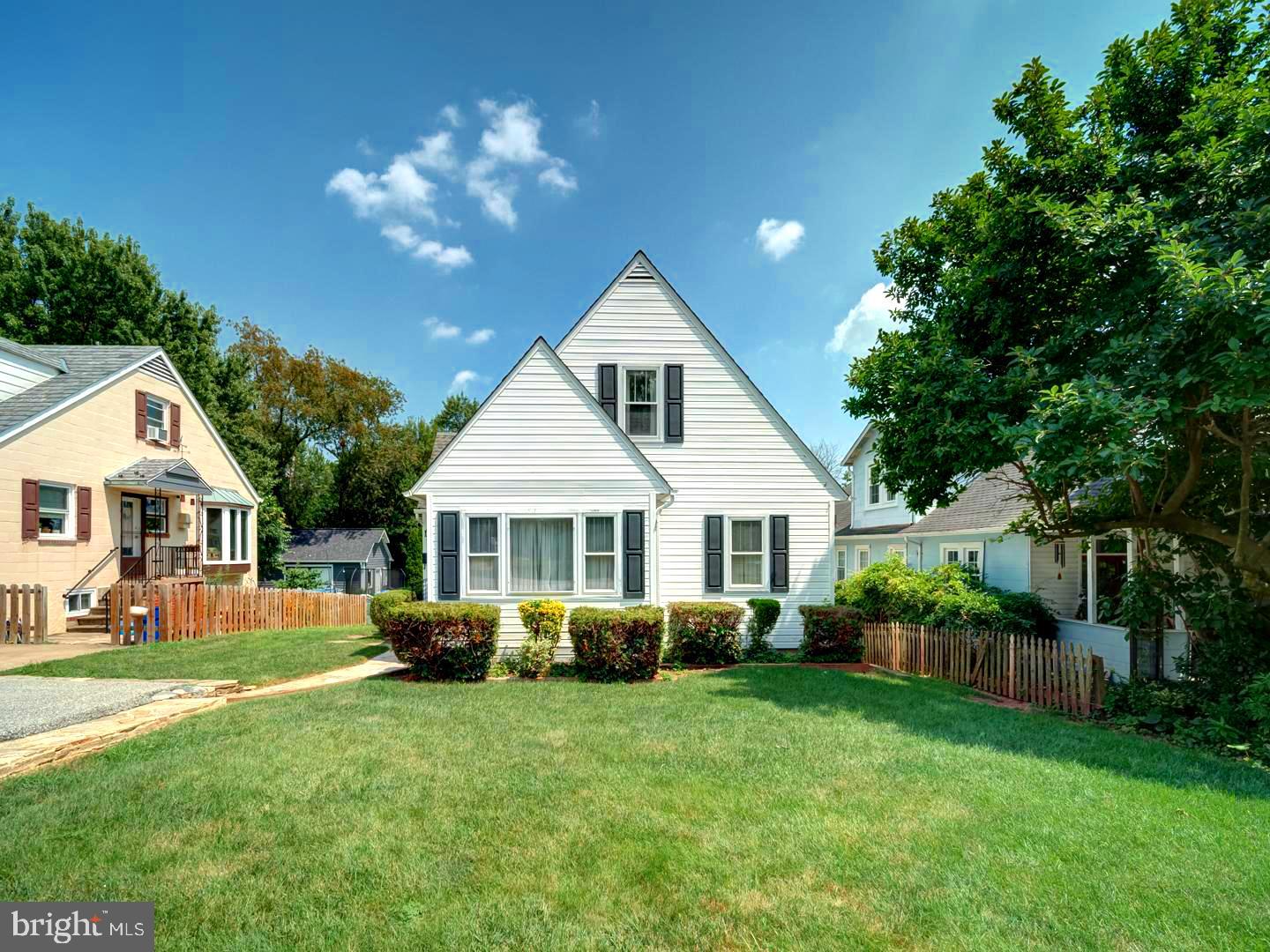 6505 Beechwood Road Baltimore, MD 21239 - Photo 2 of 46 a front view of house with yard and green space
