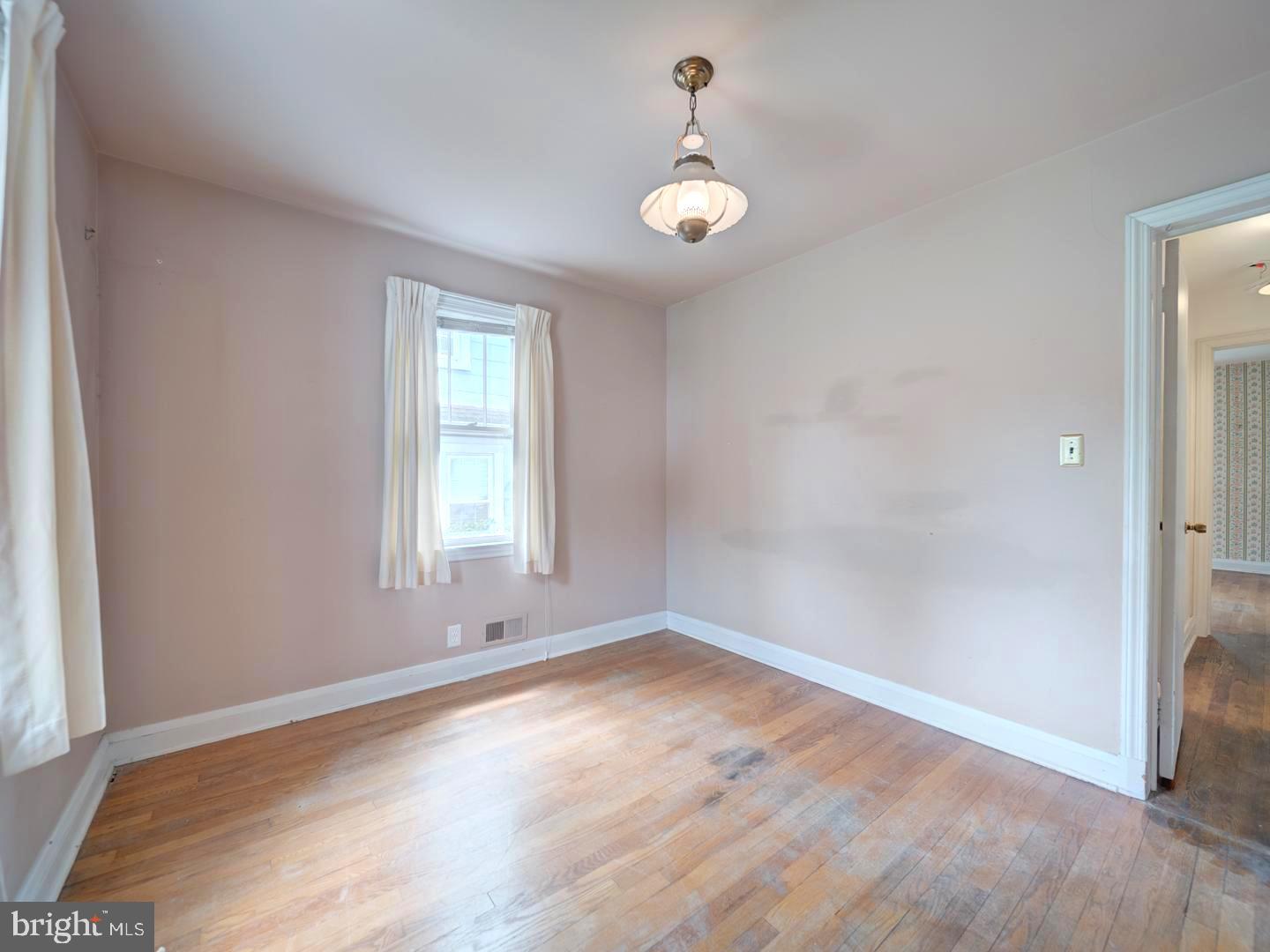 6505 Beechwood Road Baltimore, MD 21239 - Photo 26 of 46 an empty room with a window