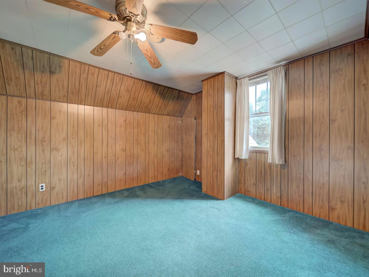 6505 Beechwood Road Baltimore, MD 21239 - Photo 36 of 46 wooden floor in an empty room and a window
