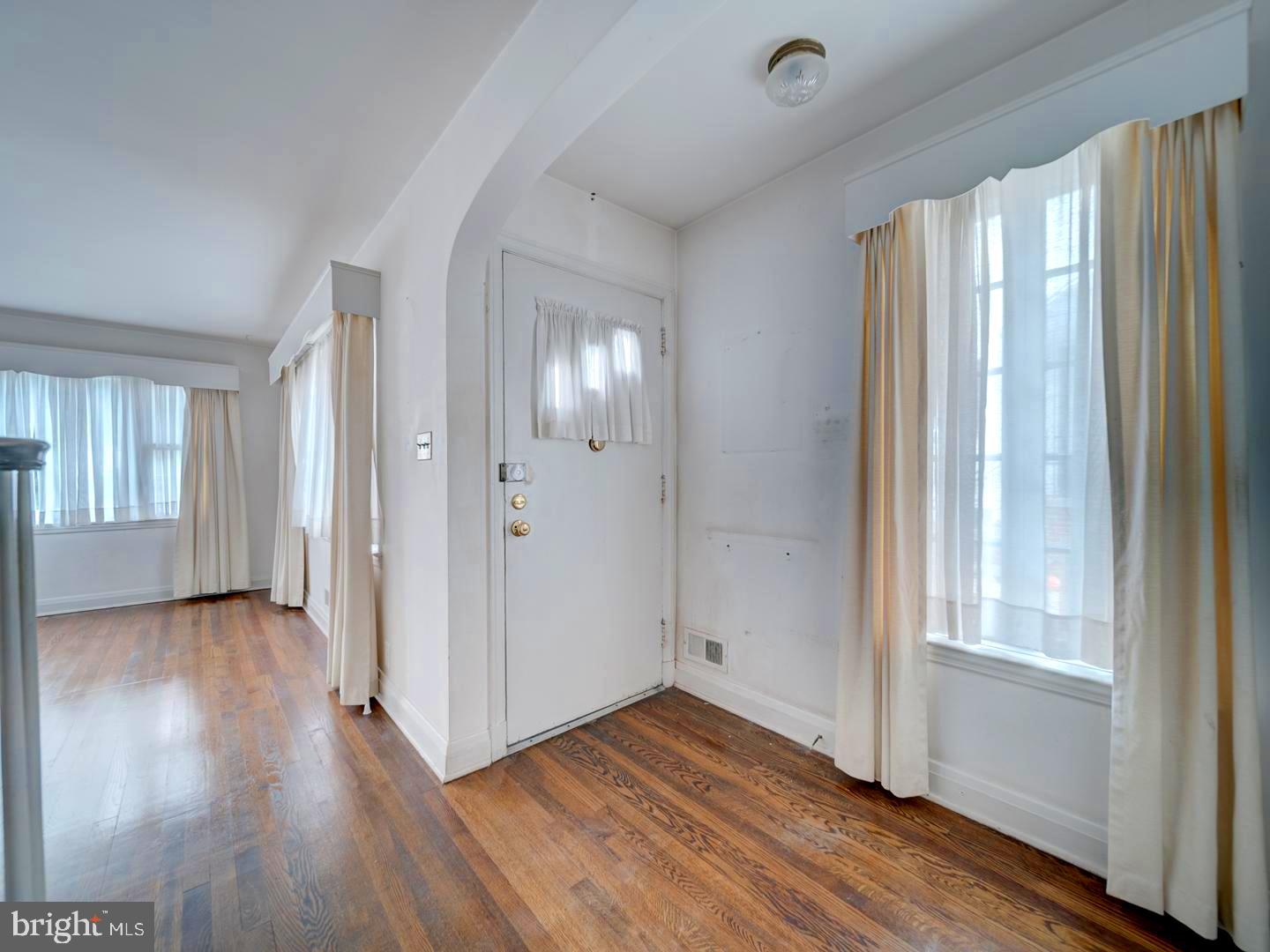 6505 Beechwood Road Baltimore, MD 21239 - Photo 4 of 46 a view of entryway with wooden floor